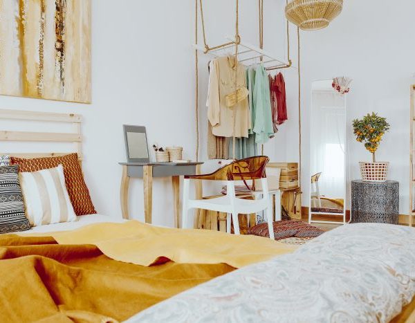 bedroom with bed covered with soft and airy pillows